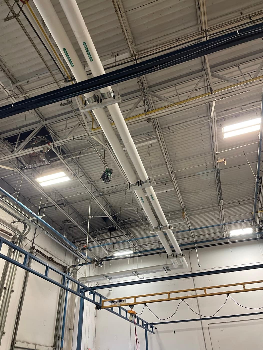 Overhead mains on trapeze hangers
