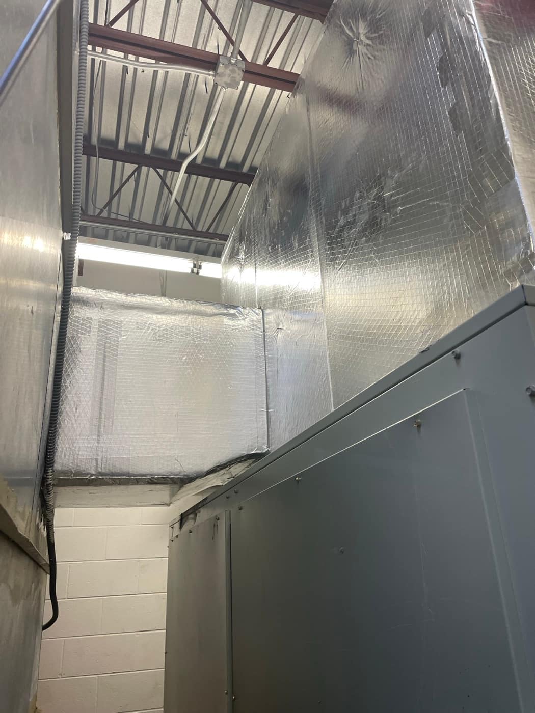 Supply and return duct risers