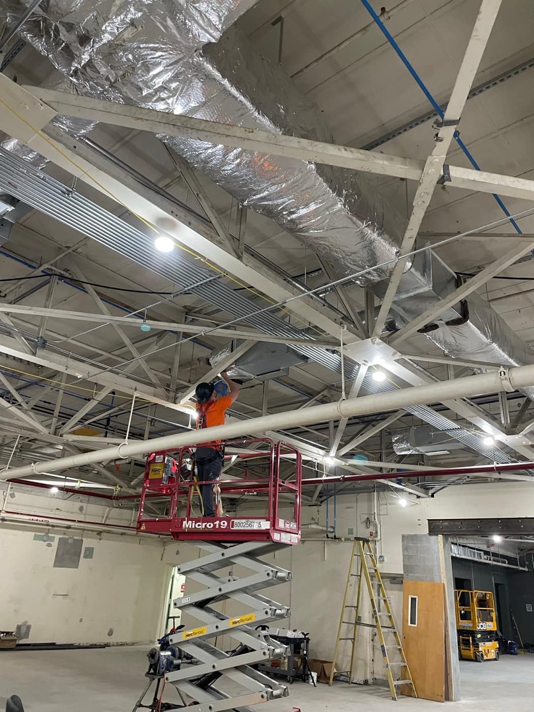 Wrapping supply duct overhead