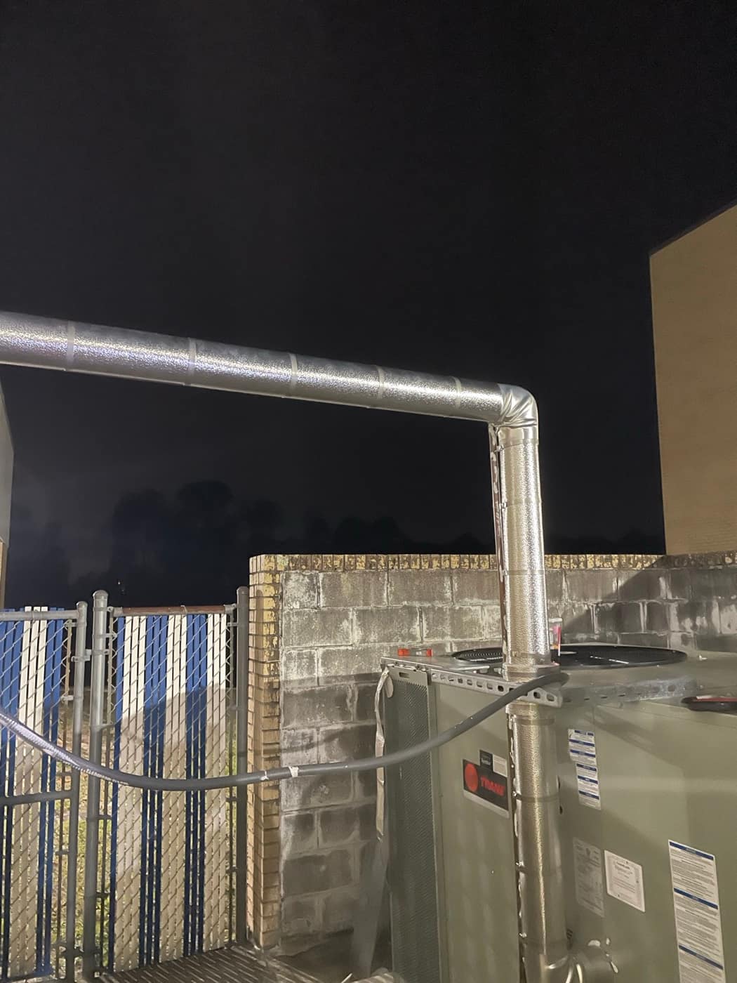 Metal jacketed line to rooftop unit