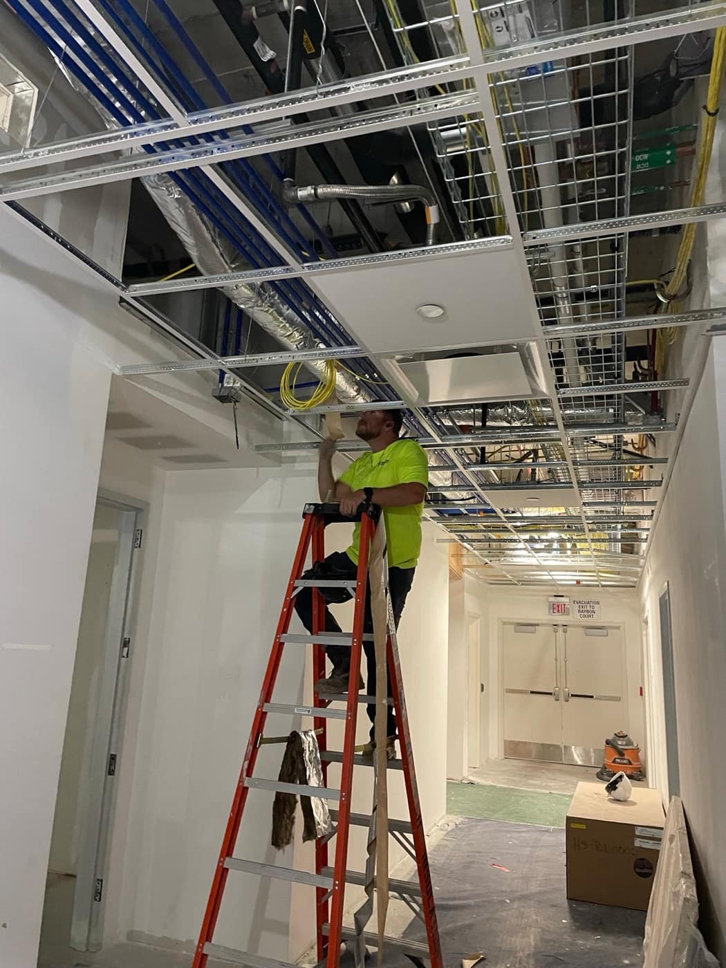 Working above the ceiling grid