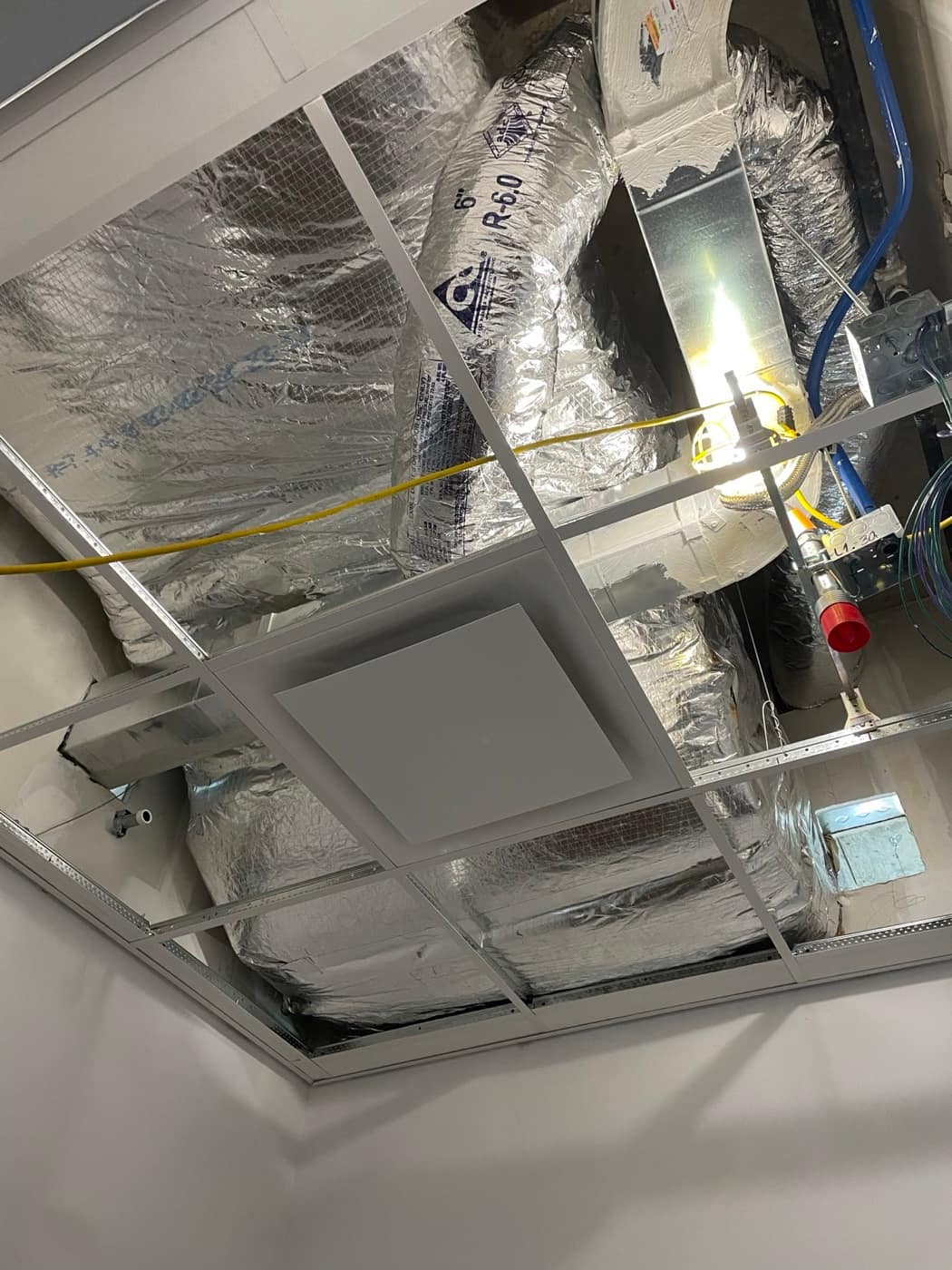 Flex duct at ceiling diffuser