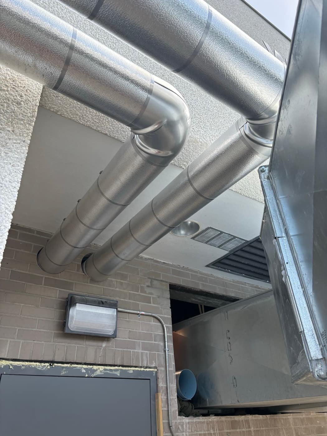 Jacketed elbows turning into wall
