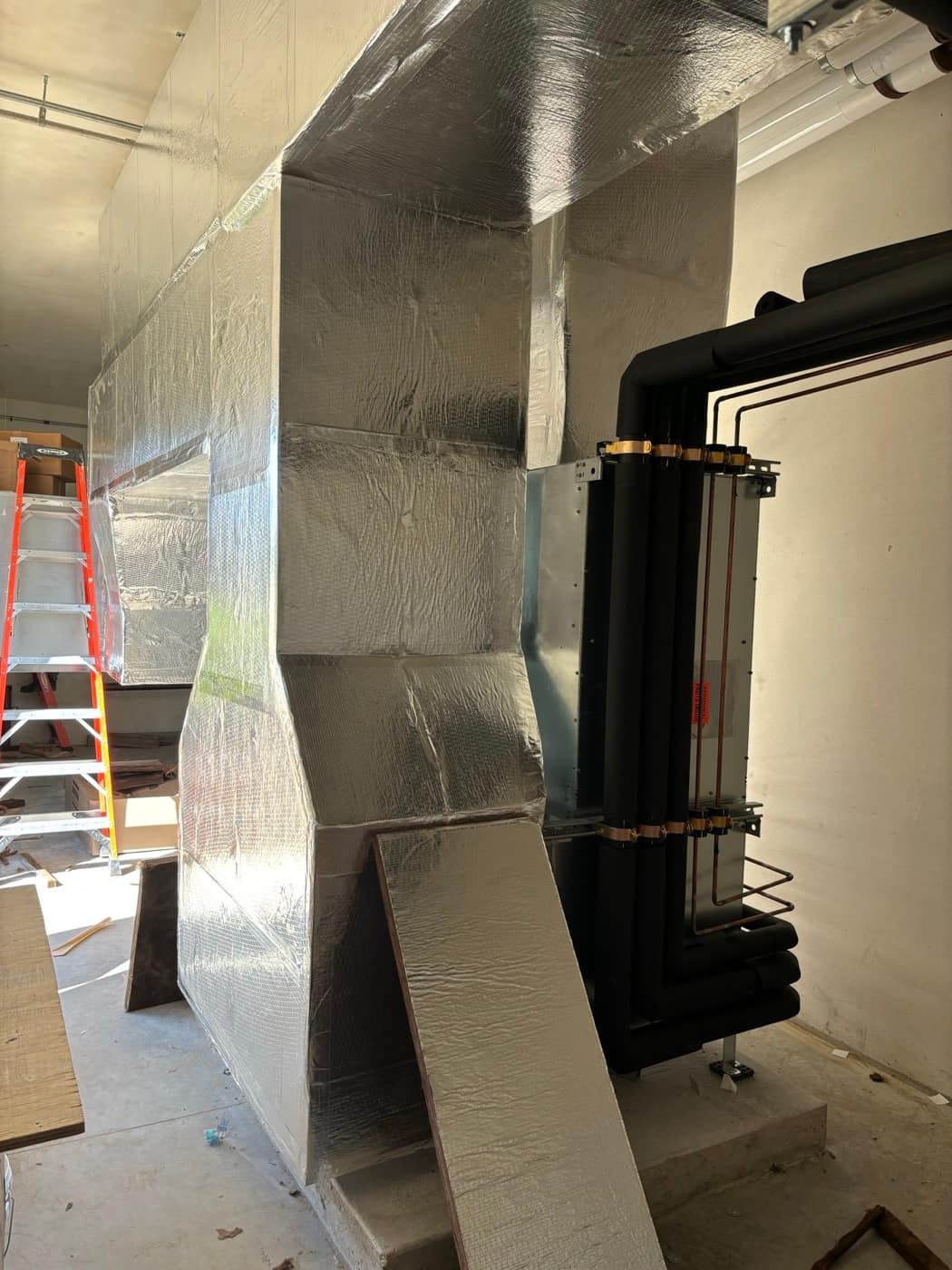 Duct board and black iron pipe