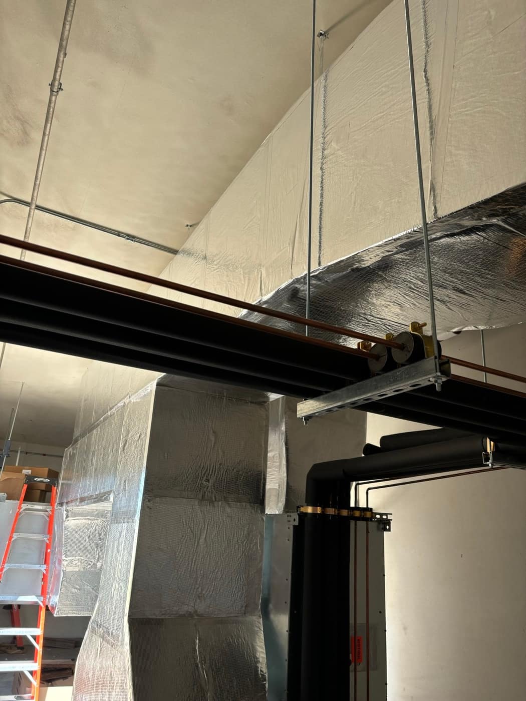 Duct with copper on trapeze