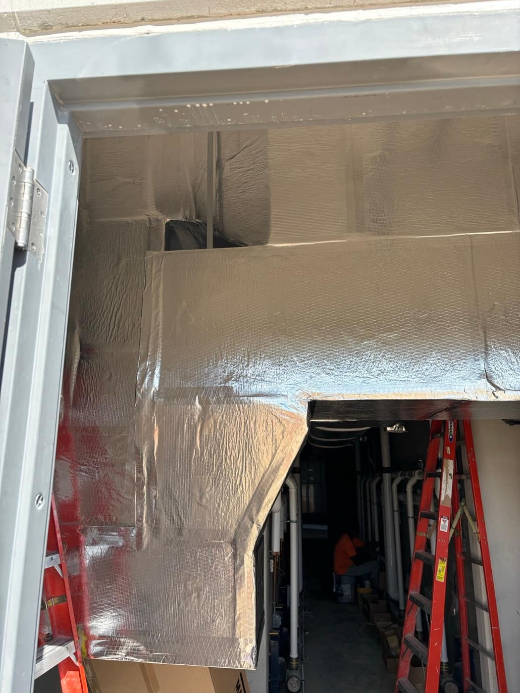 Foil wrapped duct, mechanical room