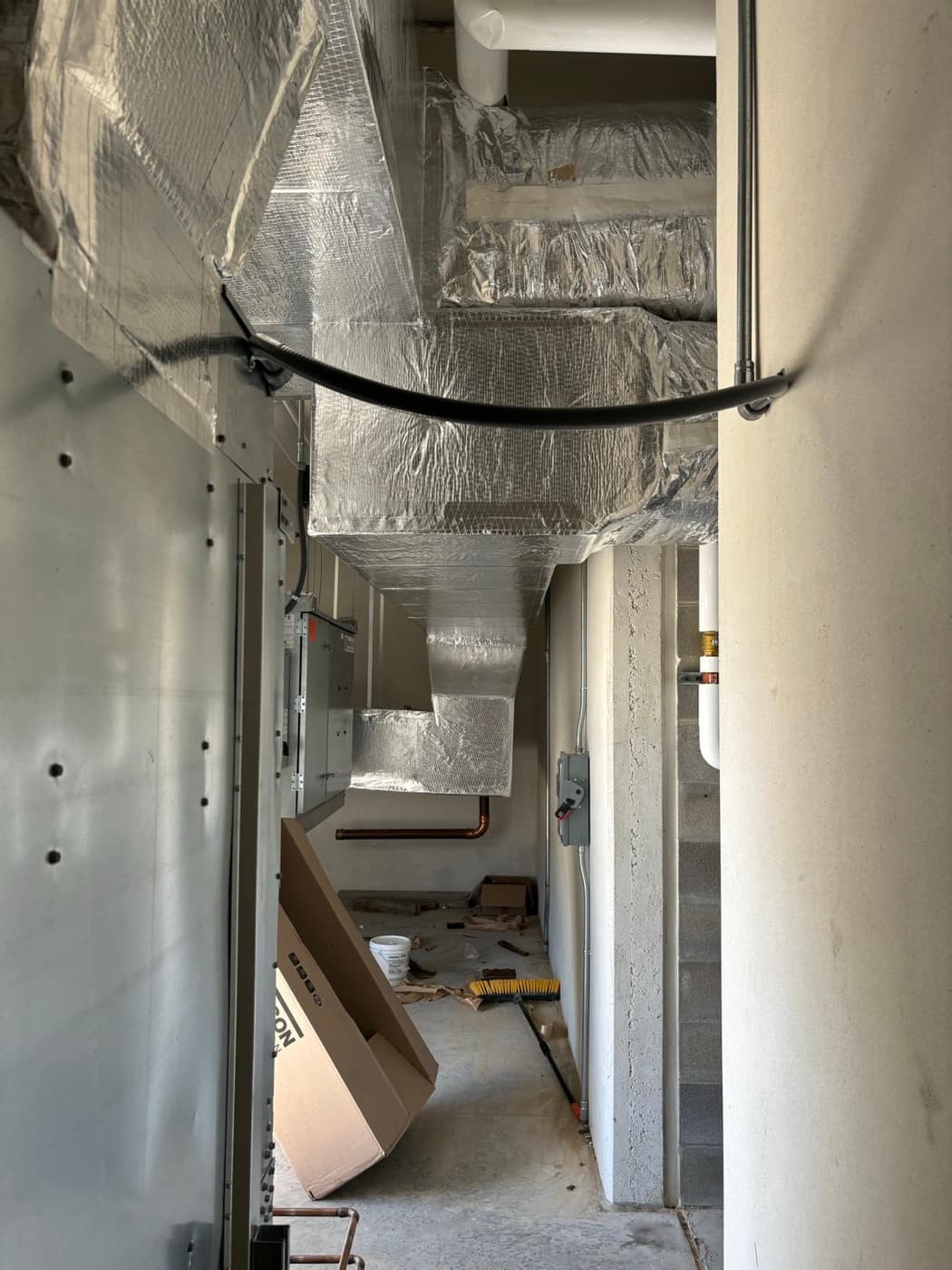 Duct run down mechanical corridor